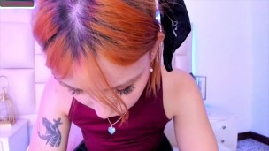 Beautiful redhead shows her armpits and plays with them