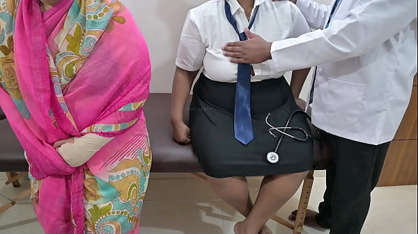 Doctor using patient infront of mom